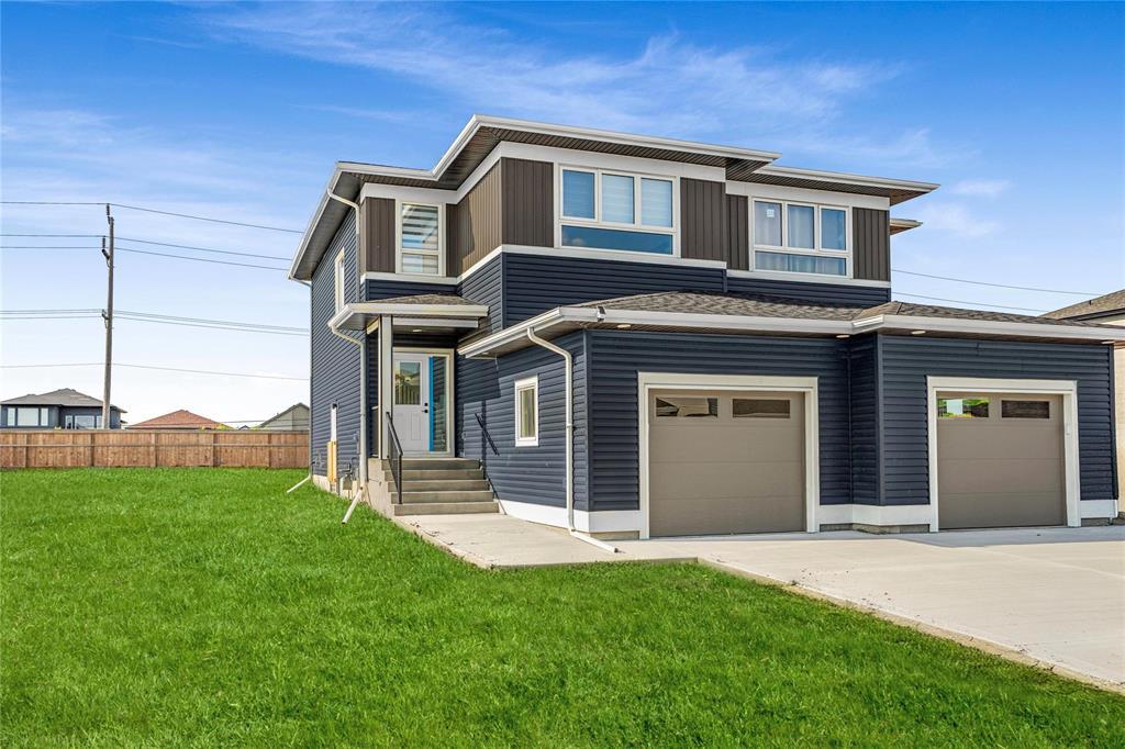 Exterior of the Manak Homes attached show home at 274 Bill Briercliffe Drive